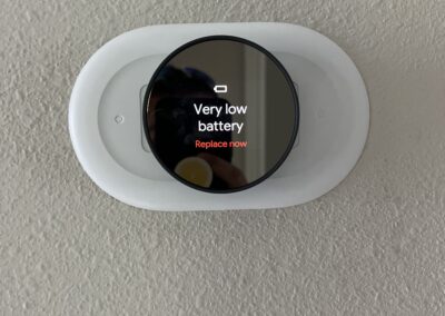 Smart thermostat was flashing "Very Low Battery - Replace Now" found during our Shield Home Watch Service Call in Lakewood Ranch and Manatee County!