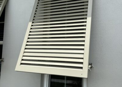 Bahama shutter was recently damaged during a wind storm in LakeHouse Cove at Waterside. Two of the fins were bent down causing a whistling noise during heavy wind identified during our Shield Home Watch Service Call in Lakewood Ranch and Manatee County!