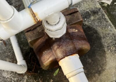 Rusty and loud pool pump developed a leak causing water to pool under the pump ultimately leading to pump failure was uncovered during our Shield Home Watch Service Call in Rosedale Golf and Country Club in Lakewood Ranch and Manatee County!