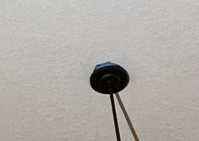 Hanging light falling from the ceiling was witnessed during our Shield Home Watch Service Call