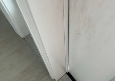 Front door seal of a new construction home was allowing air, bugs, and debris inside the house was witnessed during our Shield Home Watch Service Call