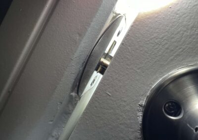 Door Handle Unable to Catch due to Wood Movement During Humid Weather was identified during our Shield Home Watch Service Call