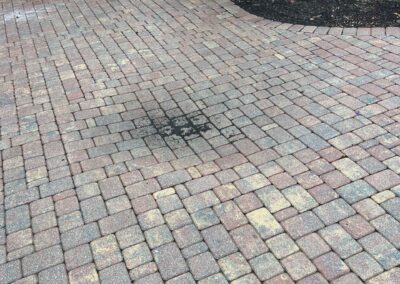 Vendor Damaged Pavers with Heavy Machinery in GreyHawk Landing was identified during our Shield Home Watch Service Call