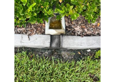 Downspout erosion after Heavy Rains in Del Webb Bayview in Parrish was identified during our Shield Home Watch Service Call