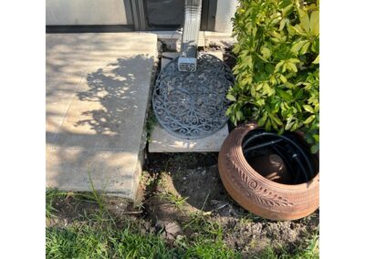 Downspout erosion causing paver sinking after Heavy Rains in Esplanade Golf and Country Club at Lakewood Ranch was identified during our Shield Home Watch Service Call