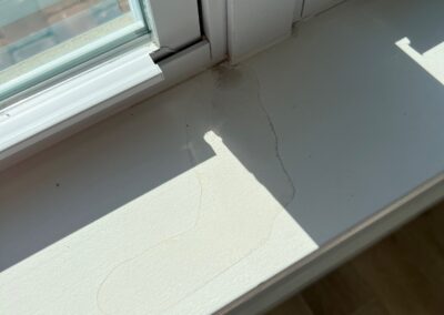 Heavy rain can cause leaks around windows especially if the weep holes are clogged was identified during a Home Watch Service Call in the Central Park community in Lakewood Ranch Florida.