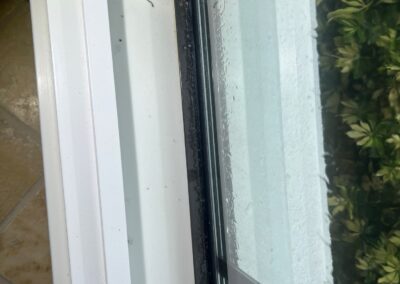 Broken window seal allowing water to enter was identified during a Home Watch Service Call in Greenbrook Village in Lakewood Ranch Florida.