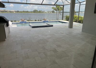 Cleared the pool and lanai area for the upcoming stone cleaning and sealing overlooking the beautiful lake in a LakeHouse Cove at Waterside community caught during our Shield Home Watch Service Call in Lakewood Ranch and Manatee County!
