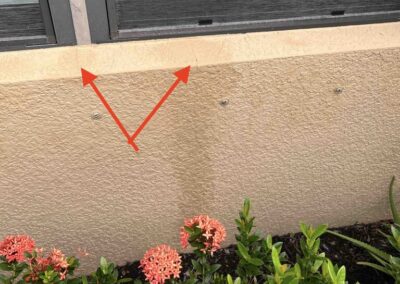 Stucco cracking with the paint appearing to be wet behind the crack allowing water inside the window and wall in Esplanade Golf and Country Club at Lakewood Ranch was identified during our Shield Home Watch Service Call