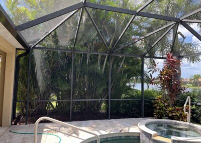 Overgrown landscaping around the lanai in River Strand Golf and Country Club in Heritage Harbour was identified during our Shield Home Watch Service Call