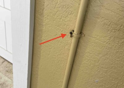 Damaged pool controller with a screw coming out potentially causing a safety risk for the renters in this Holmes Beach rental property was identified during our Shield Home Watch Service Call.